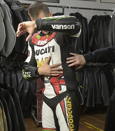 Side expansion elastic pleats expand when the air bag is activated. These elastic pleats also allows for a larger range of movement and comfort for the rider.