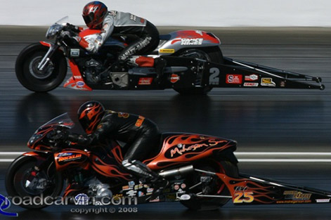 Vance and Hines competes with Guidera while wearing his Vanson Leathers drag racing suit