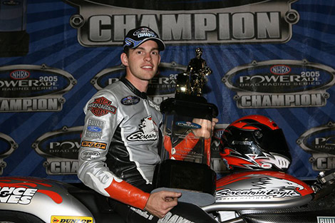 Vance and Hines in the winners circle wearing his Vanson Leathers drag racing suit